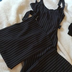 One piece black pinstripe wide leg suit